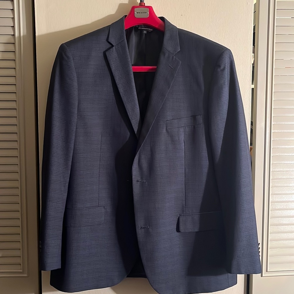 Beautiful medium blue blazer with small box square pattern.